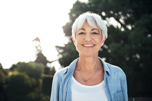 Woman smiling for the camera at Cascade Dental in Medford, OR